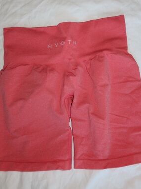 NVGTN BIKER SHORTS 
size small
Peach